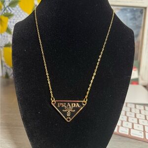 Prada Gold Triangle Pendant Necklace